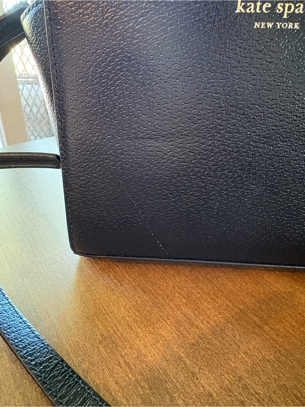 Black Kate Spade crossbody bag